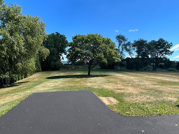 Newly paved driveway and backyard