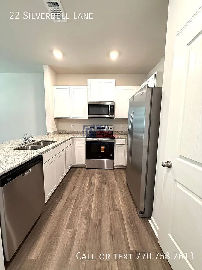 New Townhome Close to It All — Photo 4