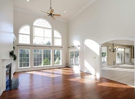 From the entry, you are welcomed into the Great Room that flows naturally into the breakfast and hearth rooms.