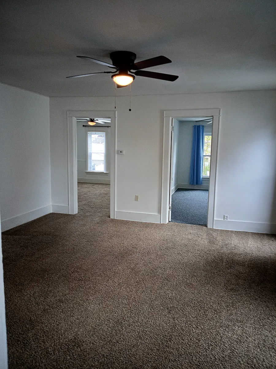 Large living room. - 1150 E 10th St #2