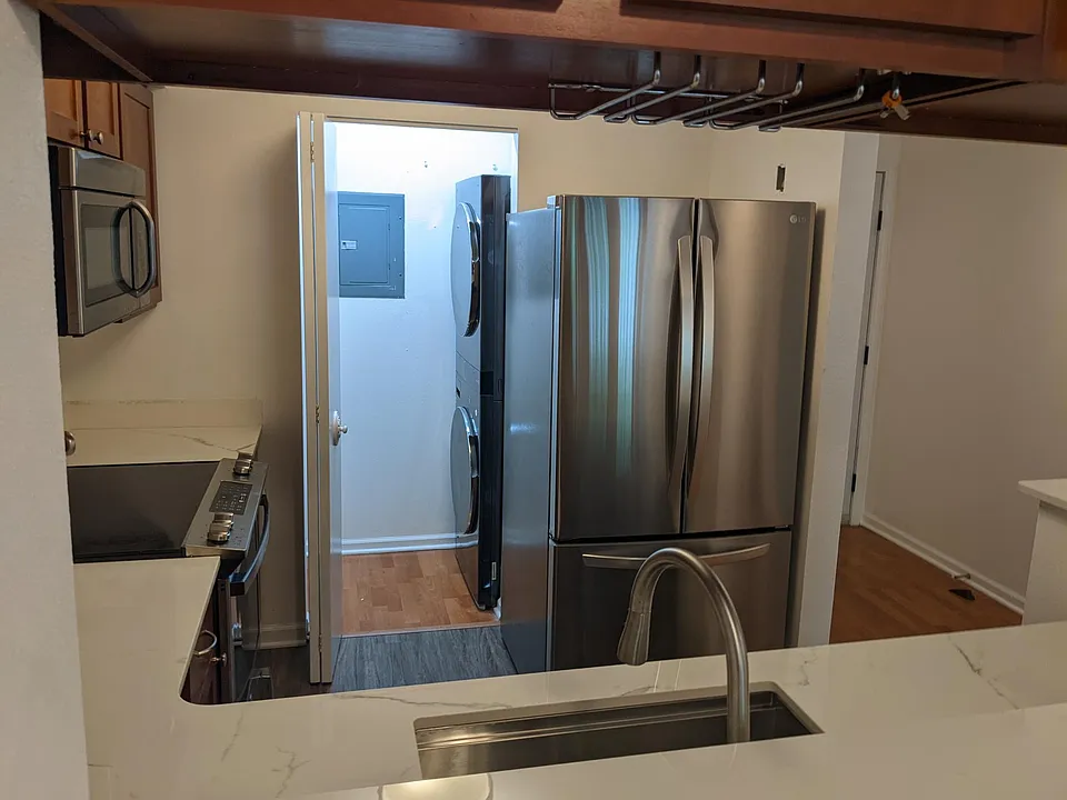 Brand new counter tops, floors, appliances, and washer/dryer