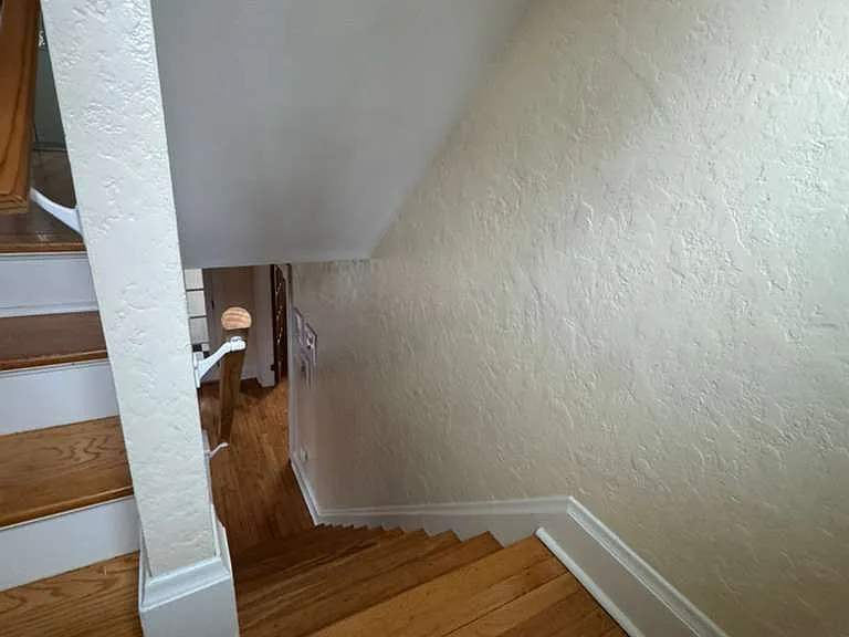 Landing between 1st and 2nd floors