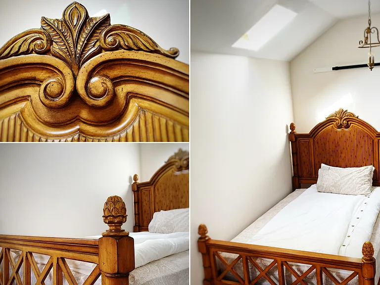 The queen bed, made from hand-carved wood with a luxe mattress (medium-firm), brings restful sleep under the vaulted ceilling.