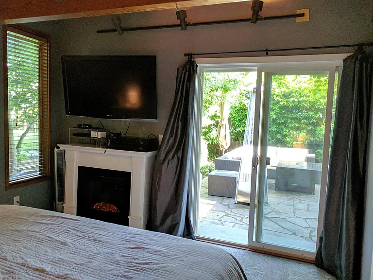 Master Bedroom: Sliding glass doors to backyard