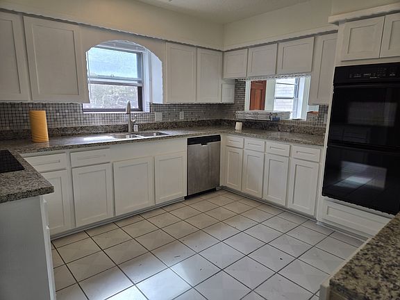 3rd image of 9003 Haverstock Dr