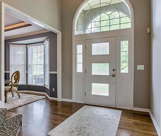 Entry/Foyer opens to office and formal dining room.
