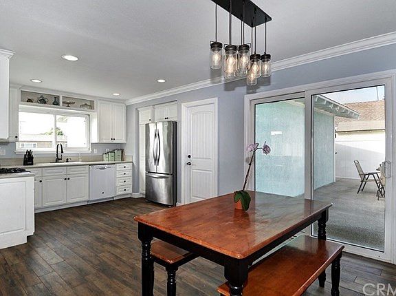 Scraped ceilings, custom lighting and newer windows & doors