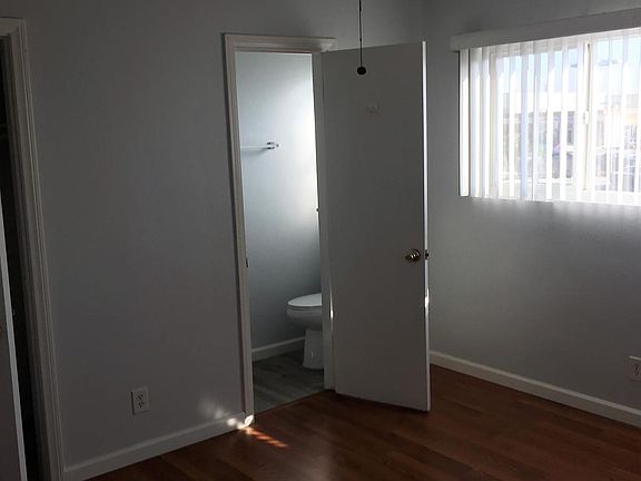 Door to 1/2 bath from bedroom