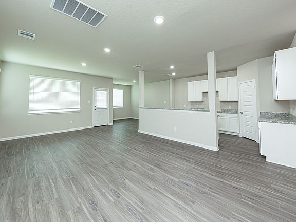 Family Room to Kitchen and Dining Area