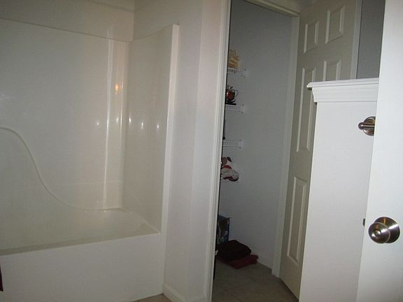 Depp linen closet in master bath