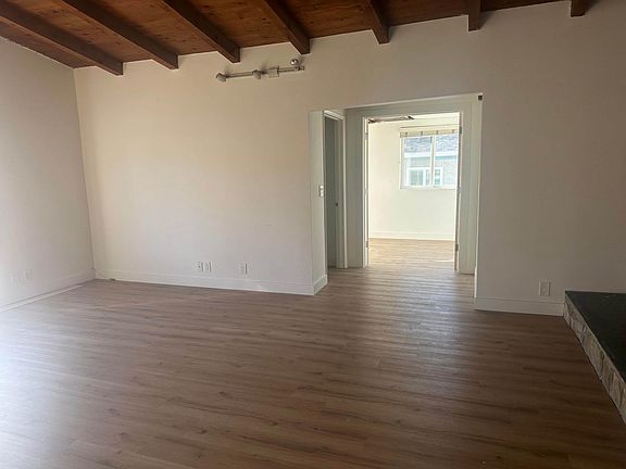 Living room looking into bonus room