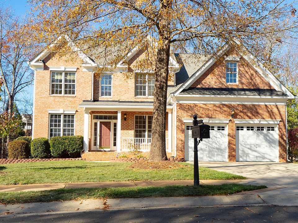 Brick front with flat driveway