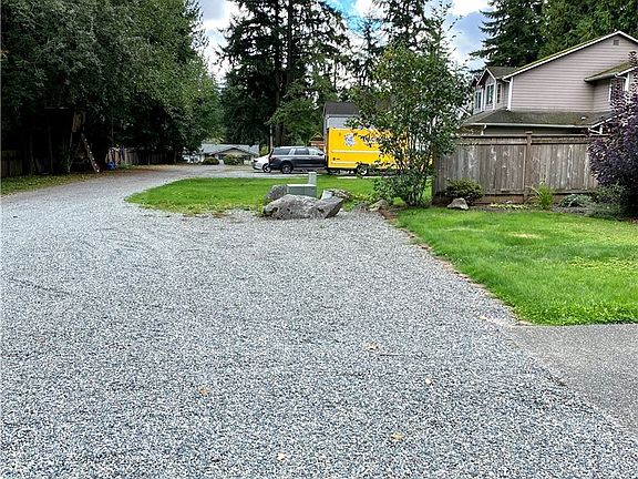 Large gravel parking spot in front of #A