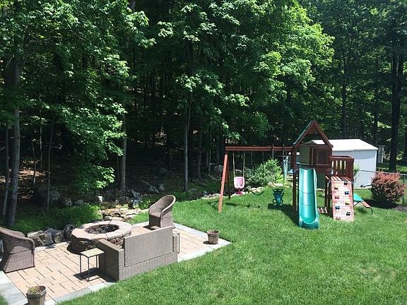 New Patio and Firepit in Wooded Lot
