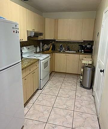 Kitchen with exit to patio