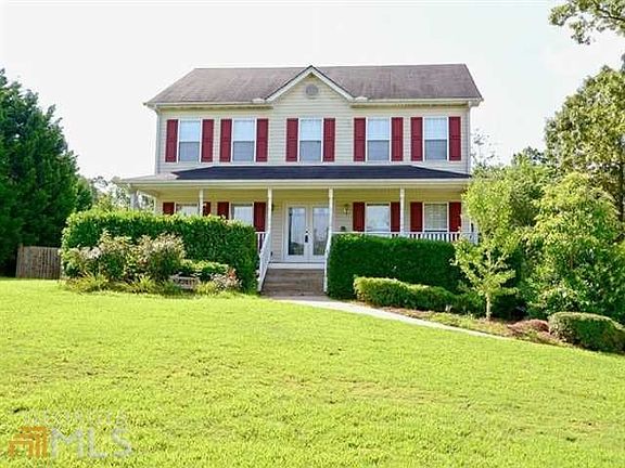 Poised on .59 acre near Lake Allatoona