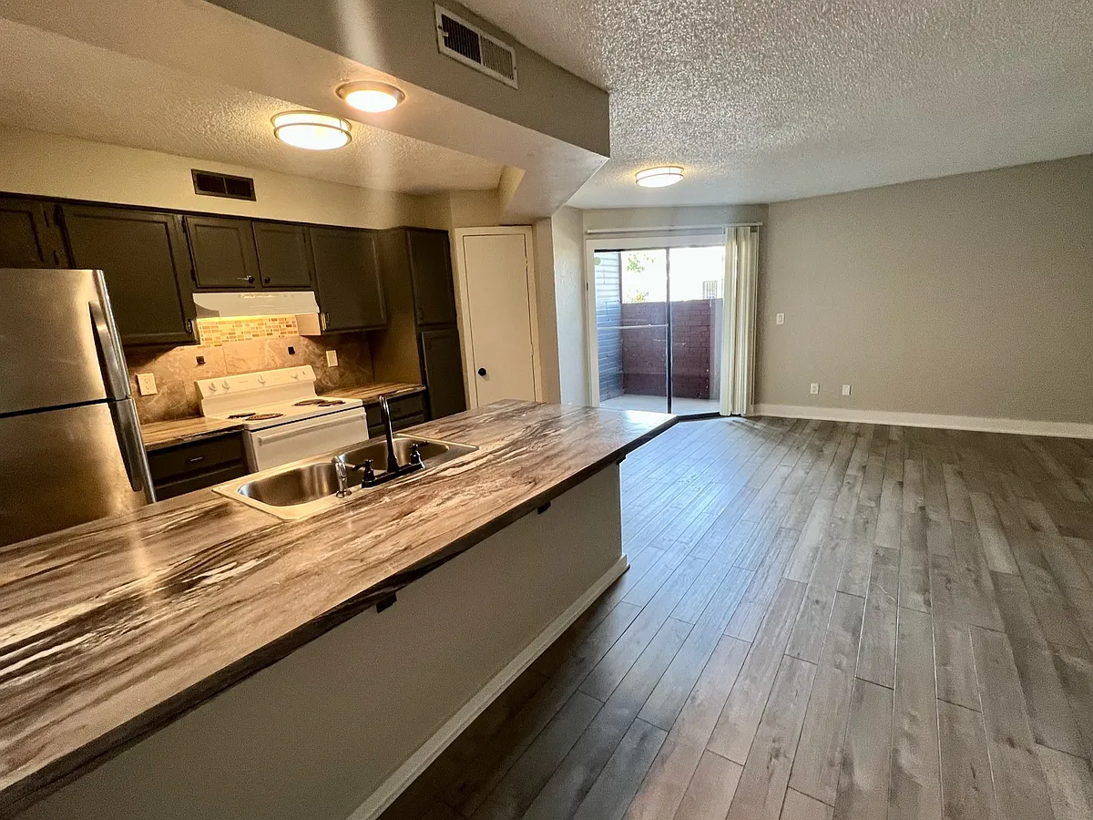 Building Photo - 1207 S Quaker Ave #102