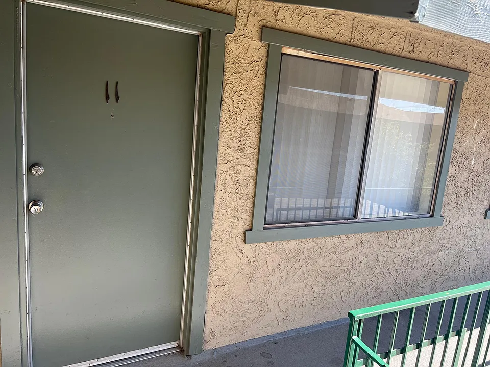 Unit 11. Front door.