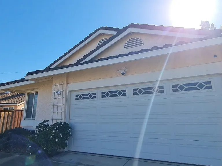 Welcome home. Well-light, security cameras installed, and there is a neat water filtration system too