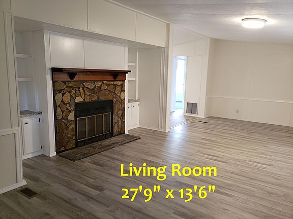 Decorative Fireplace. New Floors.