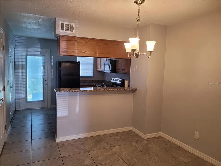 11301 Grandville Dr — Photo 6