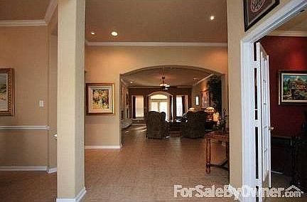 Entry leads into this open concept home. Study on right, formal dining left.
