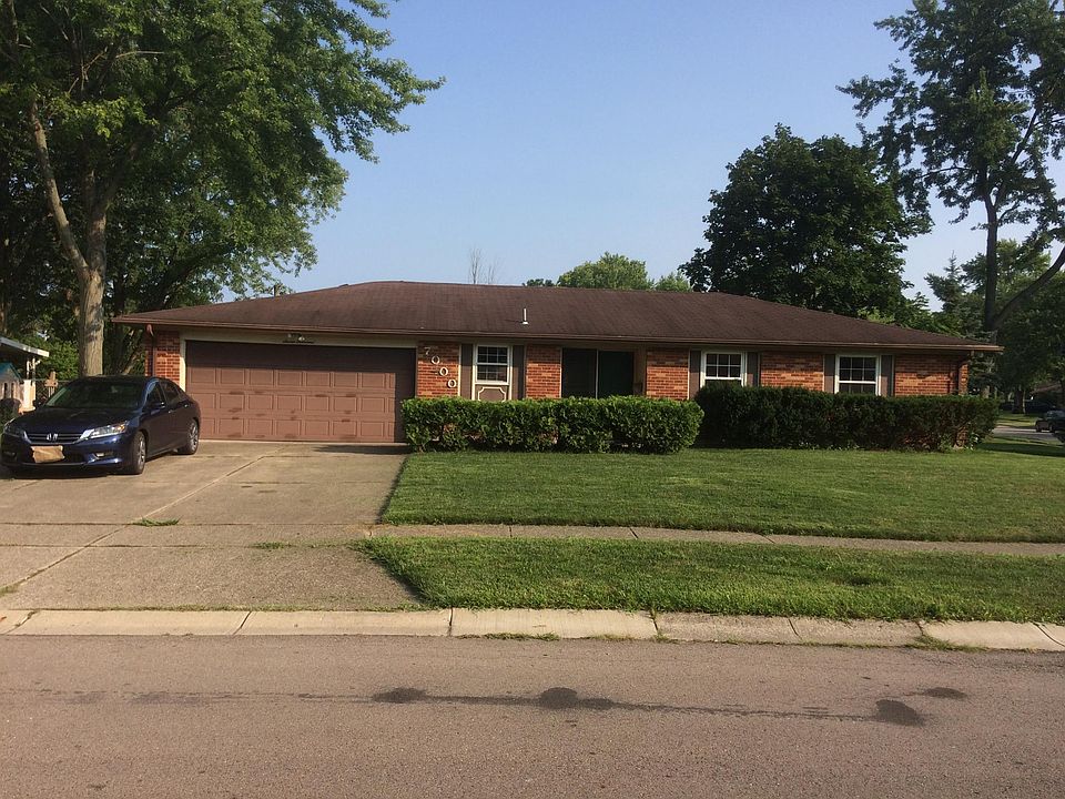 Front of house - 2 car garage.
