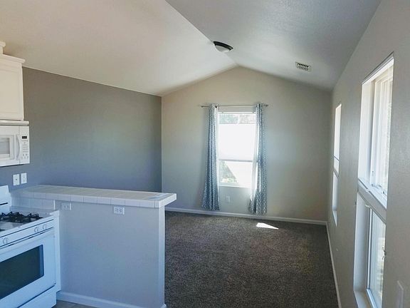 Light and Bright with Blinds that raise up or down (Levelor Duet/Cellular)