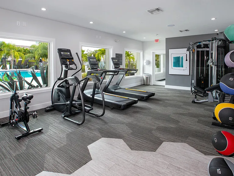 Stay active anytime in our 24-hour fitness center featuring state-of-the-art equipment and scenic pool views, providing a motivating and convenient space for your workout, day or night.