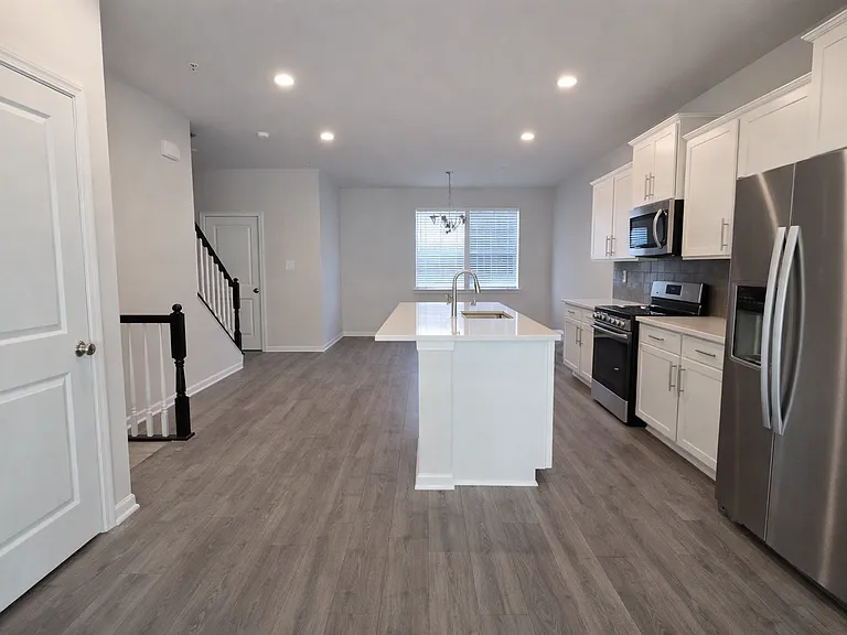 7 - Second floor kitchen and living room view 1_12242025