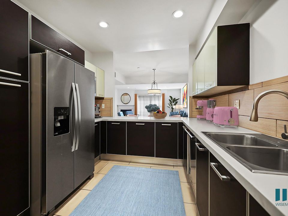 Open-Concept Kitchen with Stainless-Steel Appliances