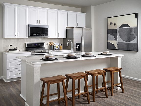 The Woodland floorplan modeled at Dakota Ridge.