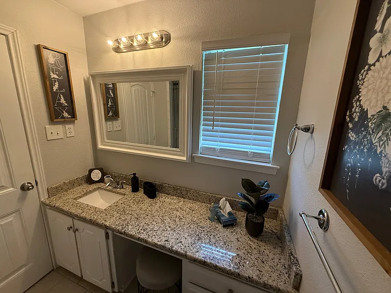 Full Bathroom 2 - walk-in shower & bathroom essentials.
