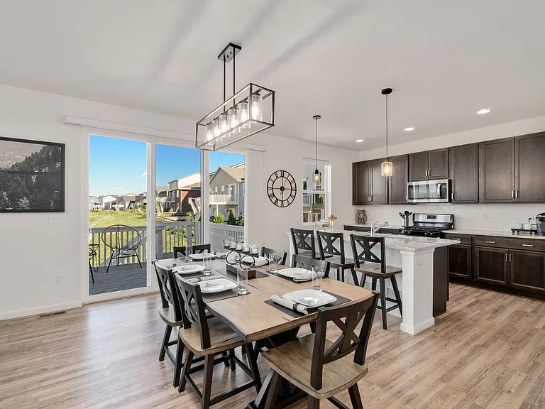 Tall Ceilings & Tall Sliding Glass Door Lets in Natural Light