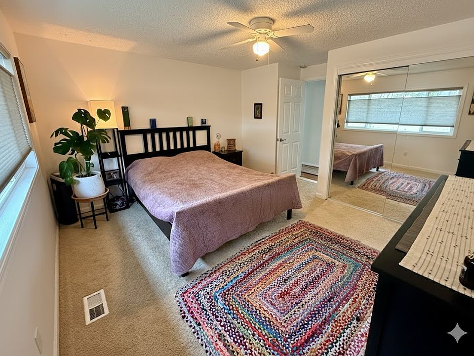 Master Spacious Master Suite featuring a queen bed, excellent natural light, and ample storage. This suite includes your own private bathroom (shower only).