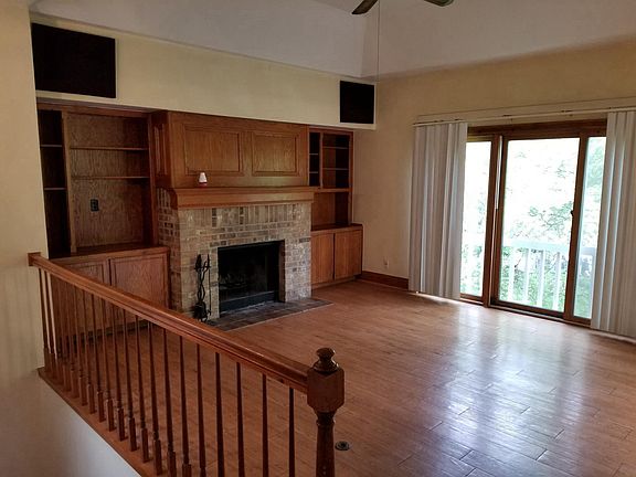 Wonderful spacious Living Room with tons of built-in shelvin