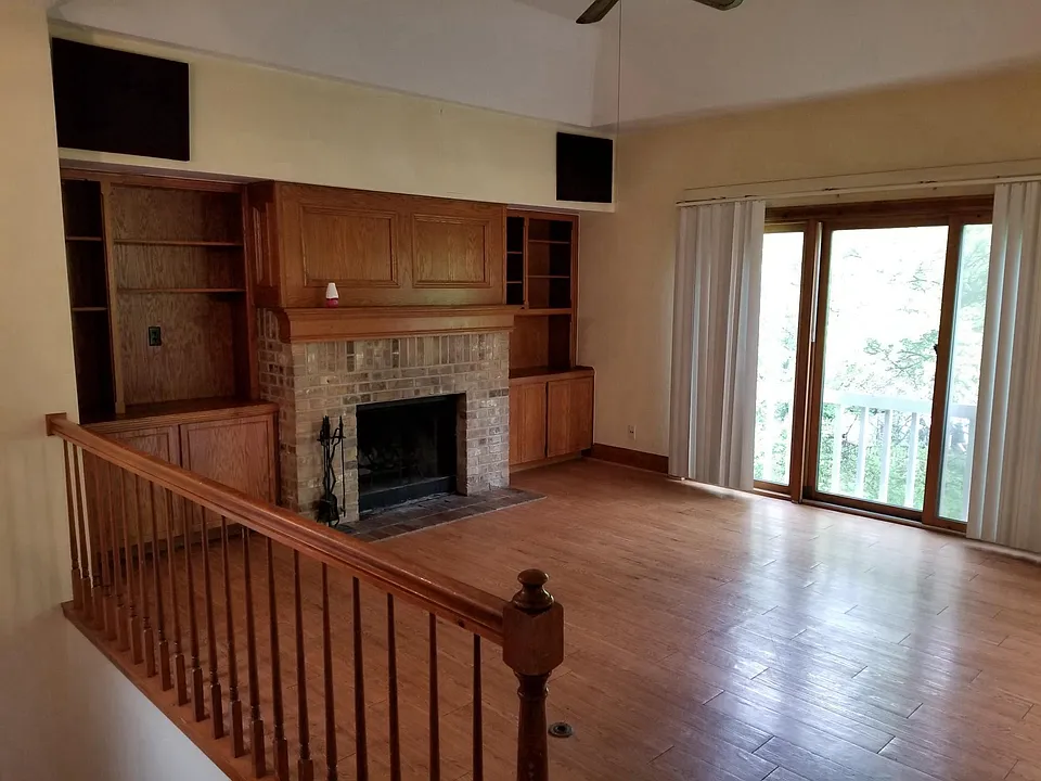 Wonderful spacious Living Room with tons of built-in shelvin