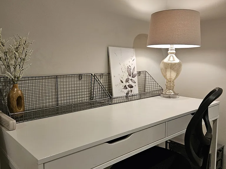 A large desk and chair for remote work days. Apartment comes with FIOS high speed internet at no extra charge!