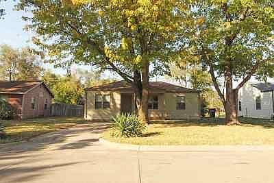 Space for 2 cars in driveway. Covered front porch with light.