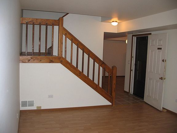 Living room connects to kitchen, laundry room, and first flo