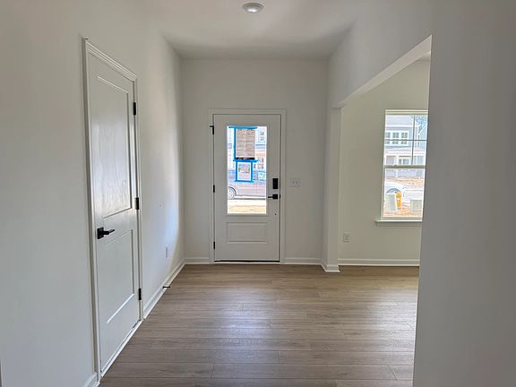 Foyer featuring the AW Collection R Serene - Soft light and open space create a calm welcome.