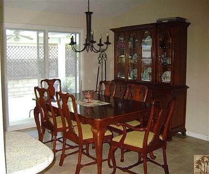 Dining Area off the Living Room & Kitchen. From the Dining Area you look out to the Patio.