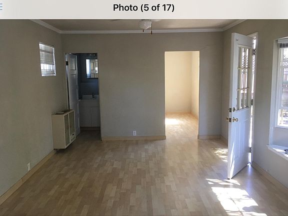 Small bathroom on left. Room to the right can hold a single or dbl bed if used as bedroom.