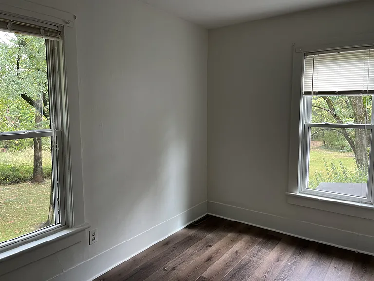 Two windows in bedroom three.