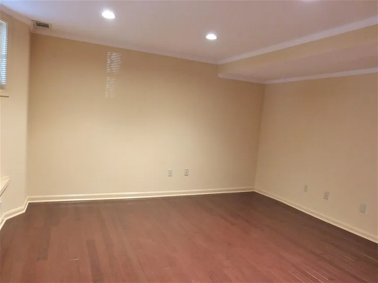 The large bedroom can easily accommodate a king bed and other furniture