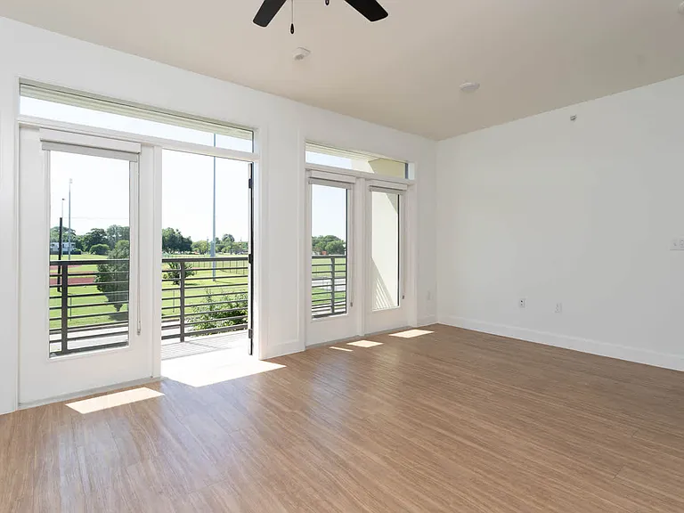 Studio with Balcony and Hard Surface Flooring