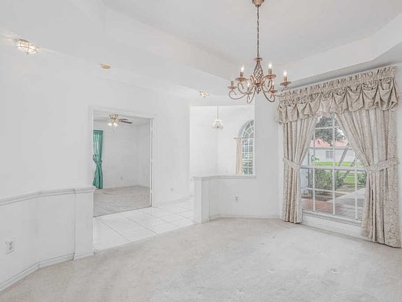 5th image of 897 SW Lake Charles Cir
