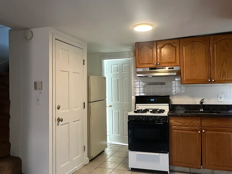 Kitchen area with access to Bi-level bedroom steps