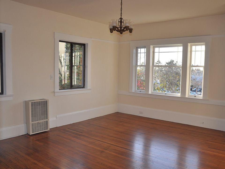 Living room / bedroom with windows to south and west