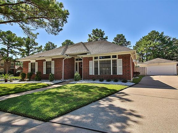 The home is located on a sensational cul de sac lot and includes a detached, extended garage accessed by a double-wide driveway.